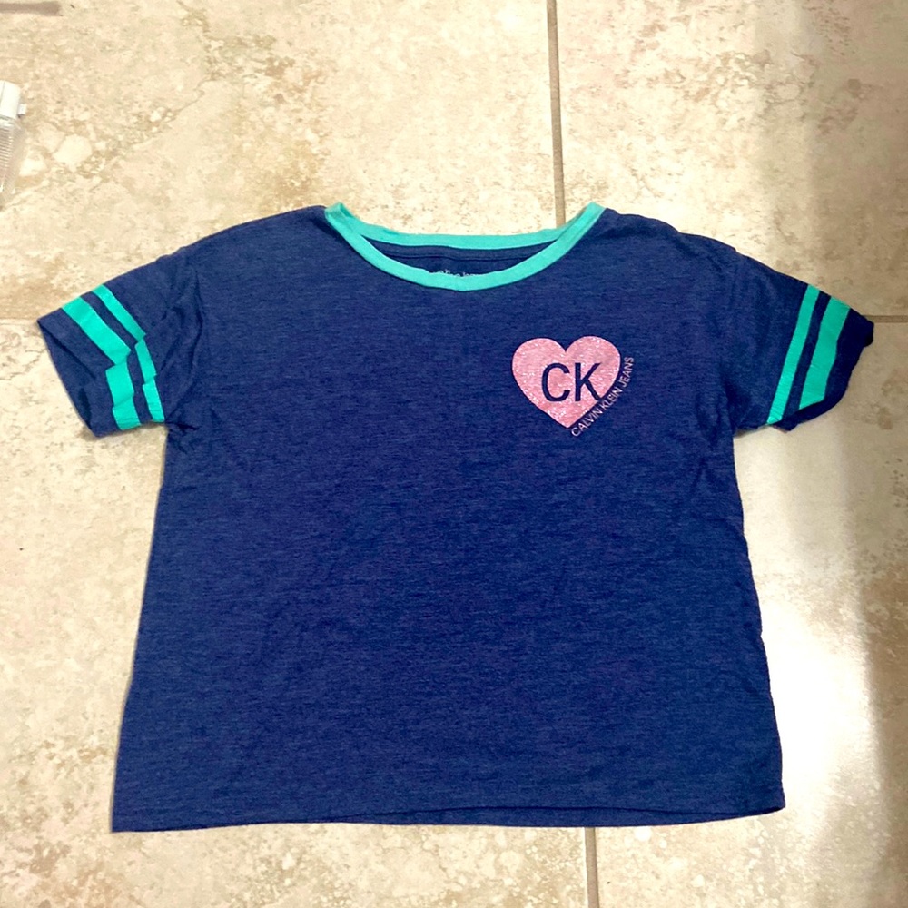 Shirt that I used to wear but grew out of it.